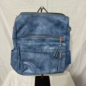 Modern+Chic Brielle Convertible Bag in vegan leather.